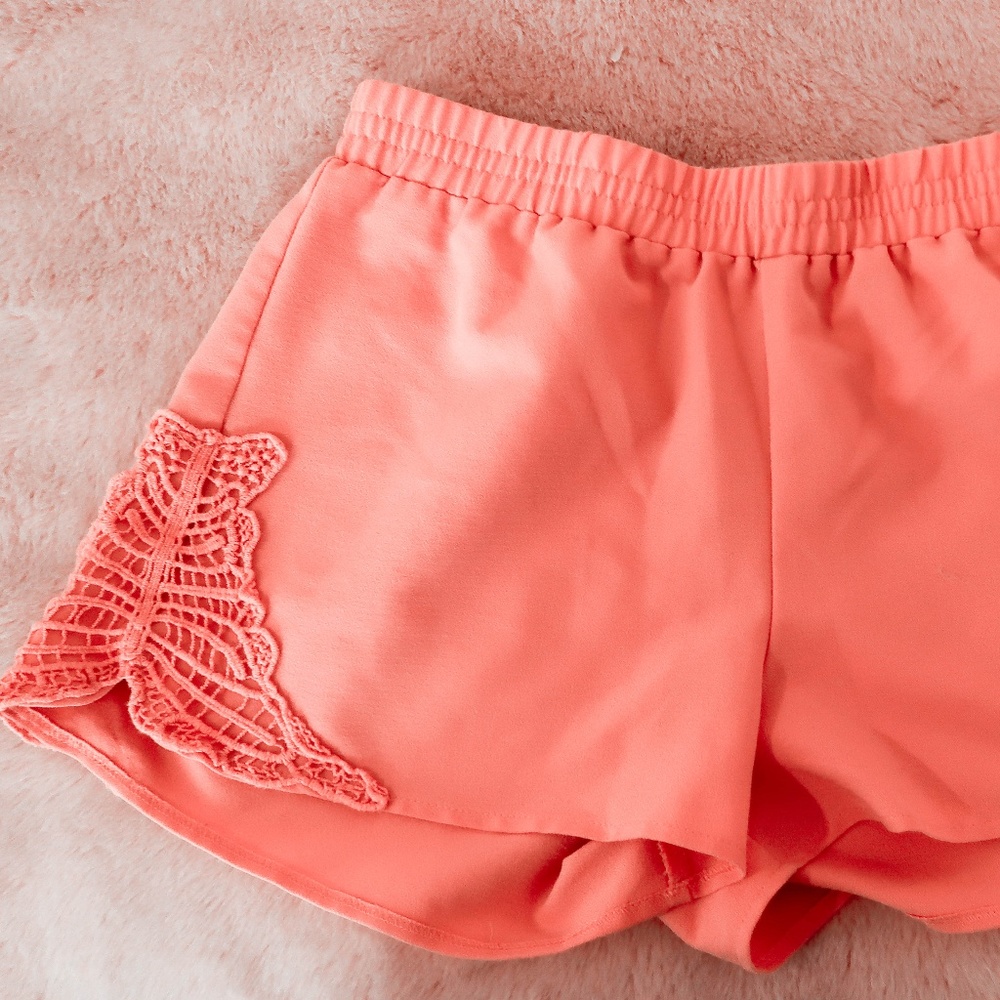 Bright Orange shorts with embroidered detailing
